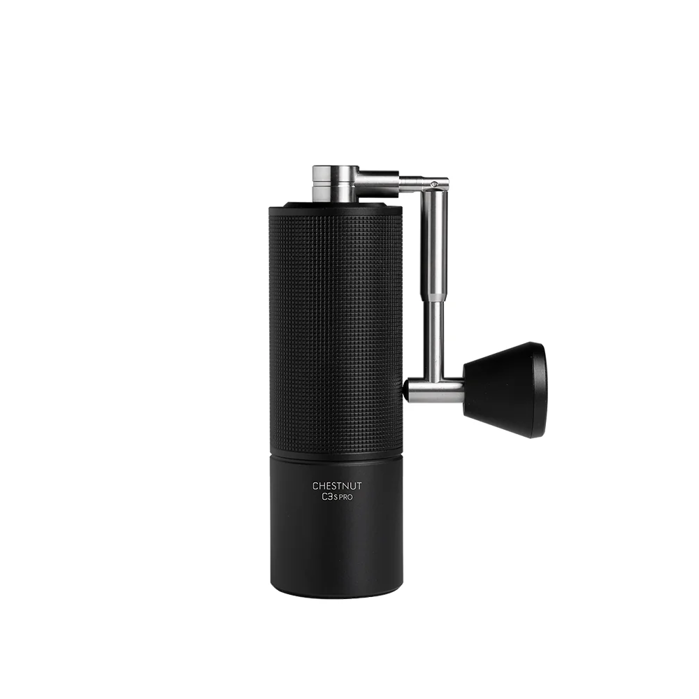 Black coffee grinder with metallic handle on a white background