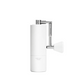 White pepper grinder with chrome adjustment wheel on a white background