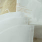 Close-up of a white coffee filter with text on a clear background